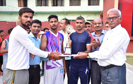 Sainik School receiving Winner's Trophy